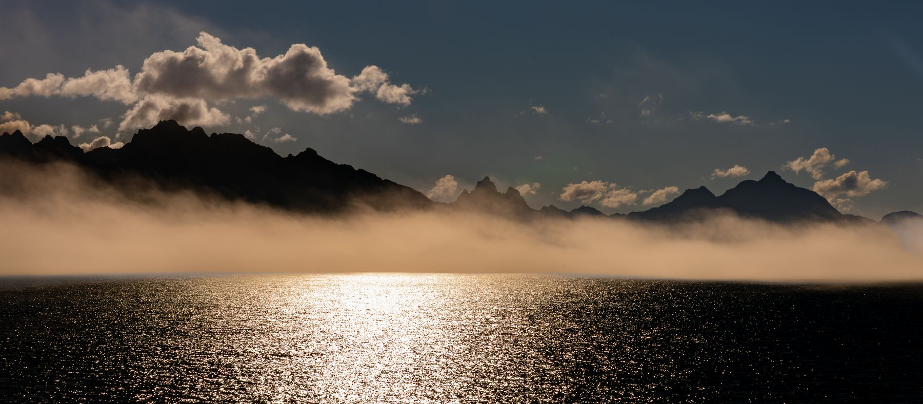 Mist Rolls Across the Scandes 10